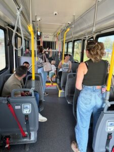 Families explore a Vine Transit electric bus at BikeFest 2026. 
